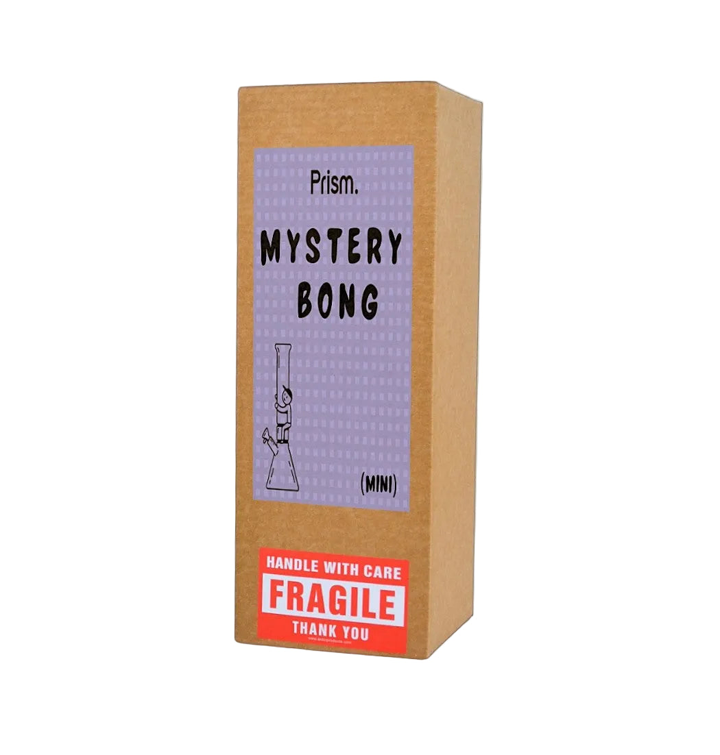 A brown cardboard mystery box with a lavender label reading 'Prism. MYSTERY BONG (MINI)' and a red 'FRAGILE' warning sticker, shown on a plain white background.