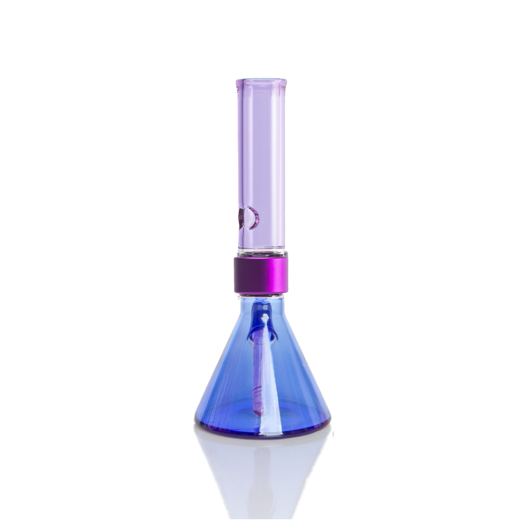 Prism MINI Duo Standard Beaker Single Stack in Sapphire Blue and Grape Jolly Rancher. A compact modular glass bong featuring a 5mm thick borosilicate beaker base in translucent Grape Jolly Rancher purple, a purple anodized aluminum MINI Halo connector, and a translucent Sapphire Blue standard MINI mouthpiece. Includes matching Grape Jolly Rancher glass MINI downstem and 14mm bowl.