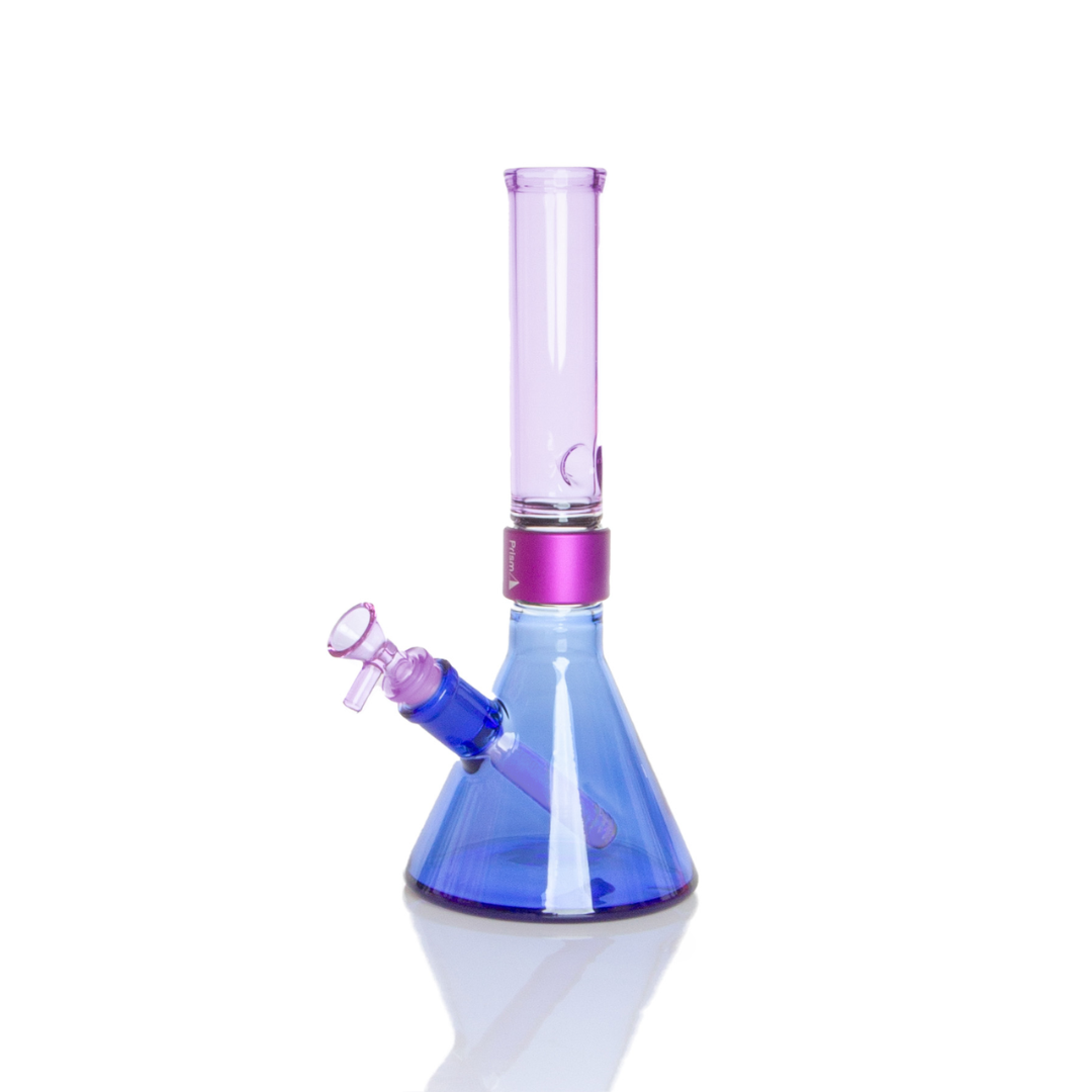 Prism MINI Duo Standard Beaker Single Stack in Sapphire Blue and Grape Jolly Rancher. A compact modular glass bong featuring a 5mm thick borosilicate beaker base in translucent Grape Jolly Rancher purple, a purple anodized aluminum MINI Halo connector, and a translucent Sapphire Blue standard MINI mouthpiece. Includes matching Grape Jolly Rancher glass MINI downstem and 14mm bowl.