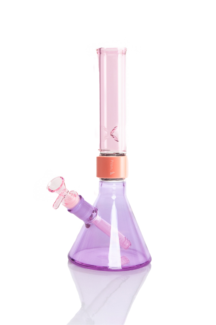 Prism MINI Duo Standard Beaker Single Stack in Grape Jolly Rancher and Pink Lemonade. A compact modular glass bong featuring a 5mm thick borosilicate beaker base in translucent Grape Jolly Rancher purple, a coral anodized aluminum MINI Halo connector, and a MINI translucent Pink Lemonade standard mouthpiece. Includes matching Pink Lemonade glass MINI downstem and 14mm bowl.