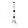 Glass water pipe with green accents on a white background