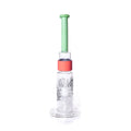 Glass water pipe with green and red accents on a white background