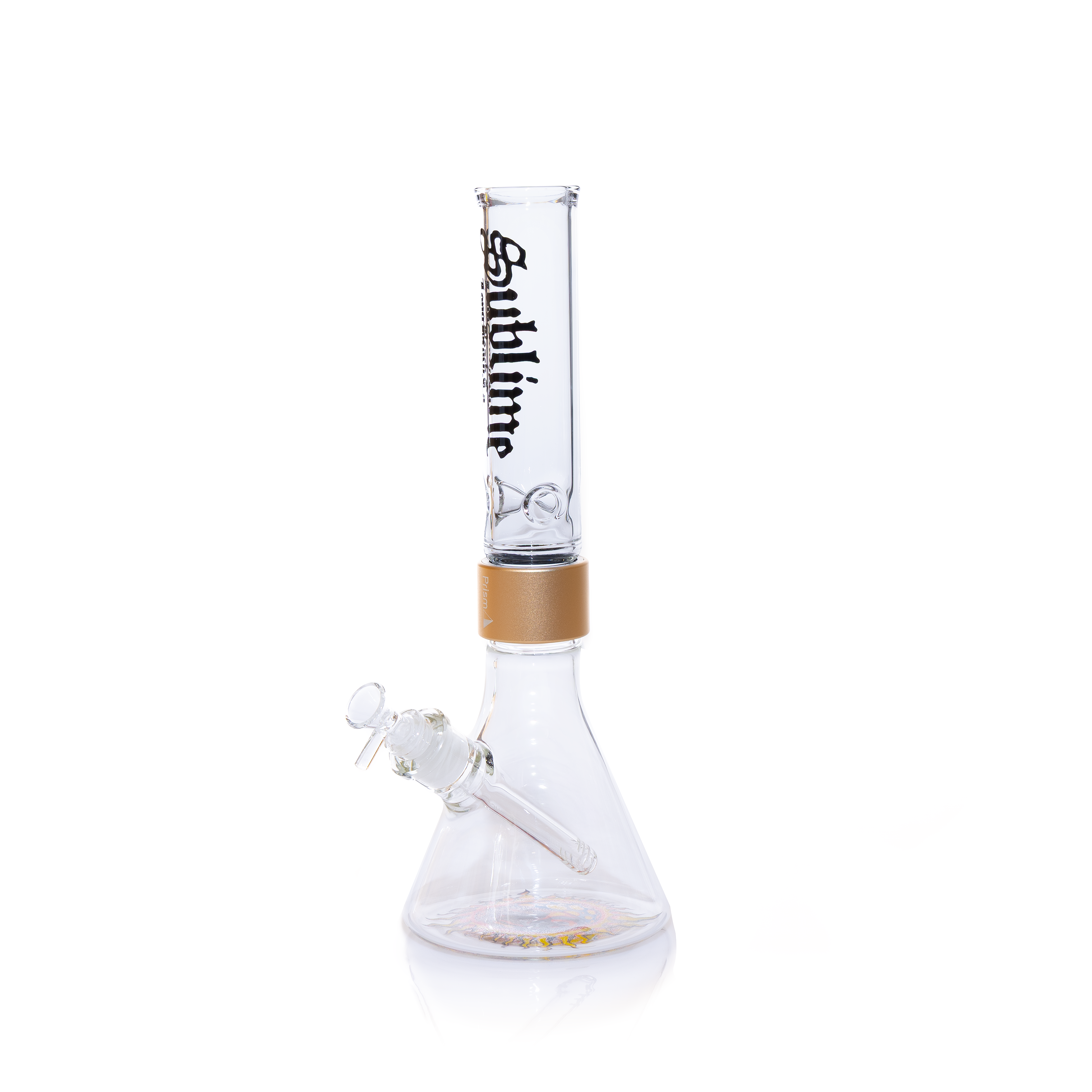A fully assembled Prism x Sublime official clear glass modular beaker bong. The transparent design offers a clean look, showcasing the gold Halo Connector and the iconic yellow sun logo on the base. The clear glass mouthpiece features the black Sublime gothic logo, emphasizing the "Long Beach, California" roots of the band.