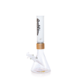 Official Prism x Sublime collaborative modular water pipe featuring a clear glass beaker base with the iconic yellow sun logo by Opie Ortiz on the bottom. This customizable bong includes a metallic gold Halo Connector and a white glass straight tube mouthpiece adorned with the black Sublime gothic logo and Long Beach, California text.